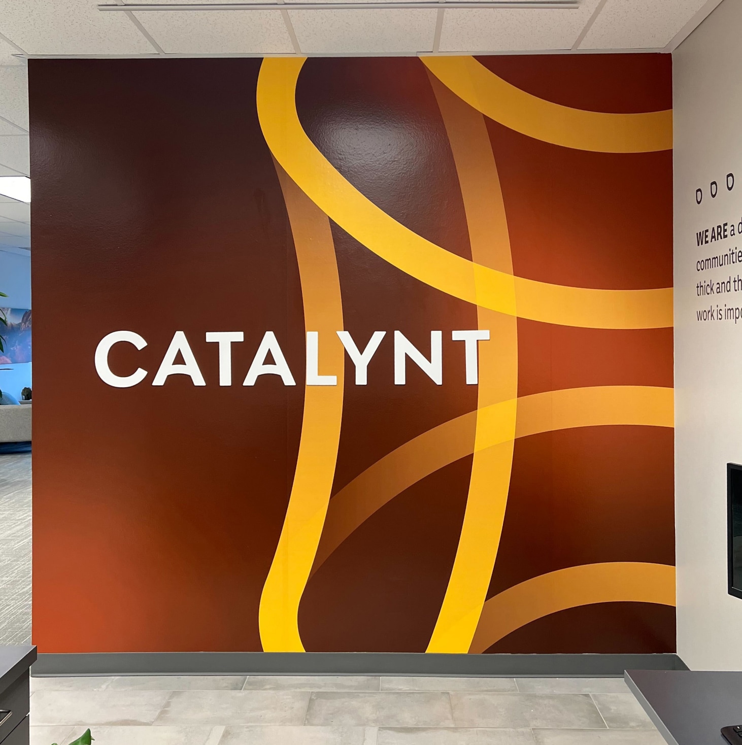 Wall in Catalynt office with Logo