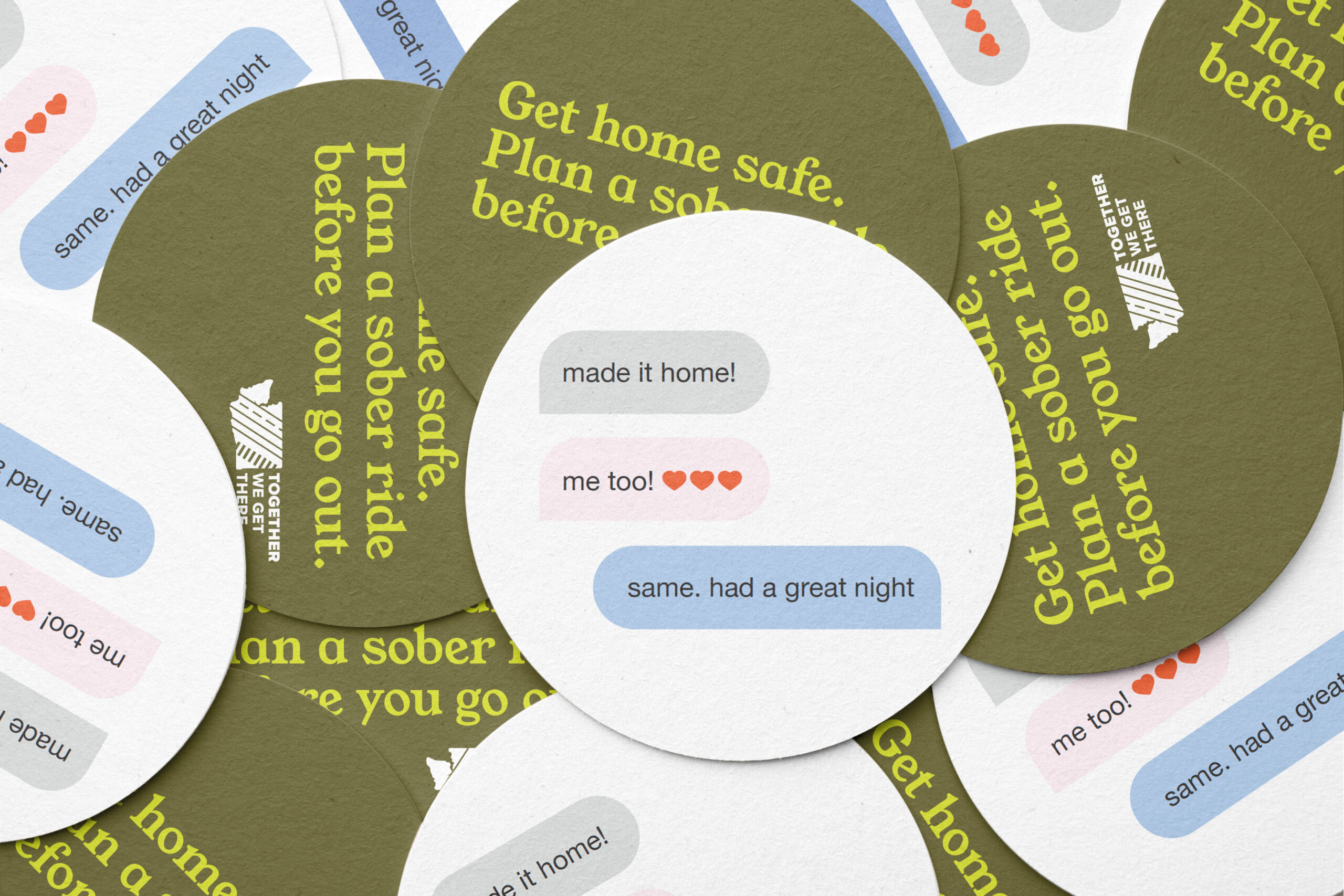 060524_WTSC_DUI_Coaster_1 (1) An image of pile of round coasters with the text: “Get home safe. Plan a sober ride before you go out.” The other side shows group-chat messages that say: “made it home!” “me too!” “same, had a great night.”