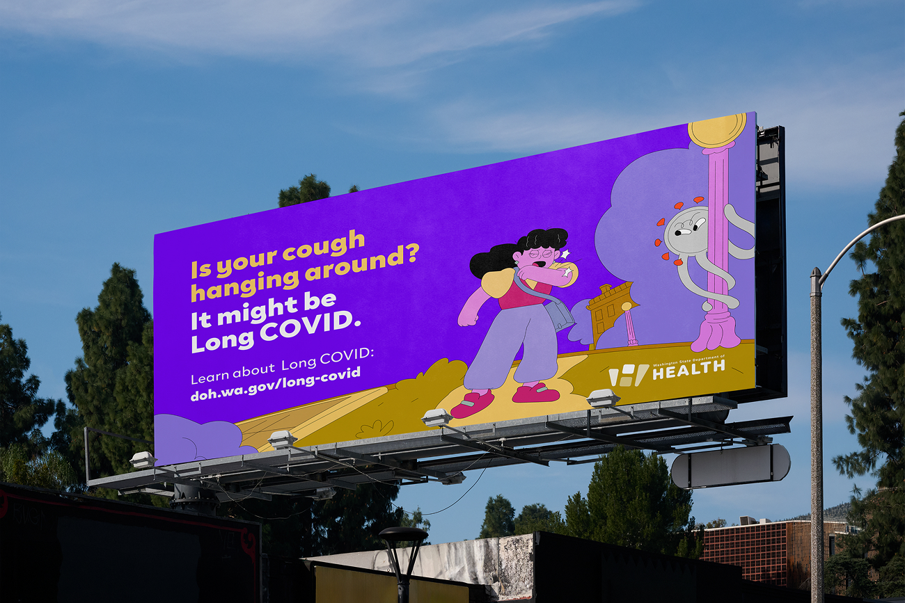 A photo of a billboard. The billboard reads, “Is your cough hanging around? It might be Long COVID. Learn about Long COVID: doh.wa.gov/long-covid.” The image on the billboard is an illustration of a woman coughing as a creature representing Long COVID spies on her nearby, with its tentacles wrapped around a lamppost.
