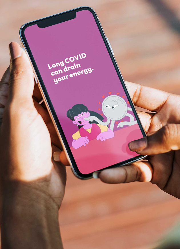 A picture of a person looking at an ad on their smartphone. The text on the phone screen reads, “Long COVID can drain your energy.” The accompanying image is an illustration of a shapeshifting creature representing Long COVID using its finger to poke an exhausted-looking woman in the cheek.